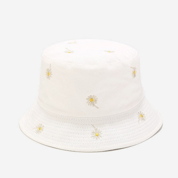 La marguerite en mode florale : symbolique, histoire et comment porter la fleur de l'été 2026